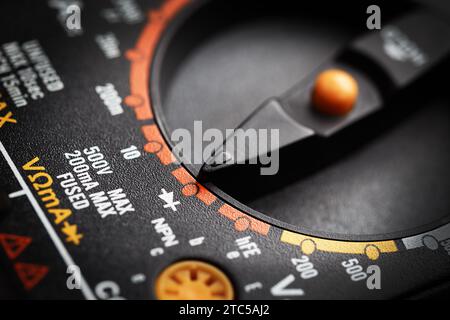 Dial for switching measurement modes of a digital mulimeter close-up Stock Photo