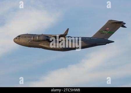 McDonnell Douglas, Boeing C-17A Globemaster III shown airborne shortly after taking off from LAX, Los Angeles International Airport. Stock Photo