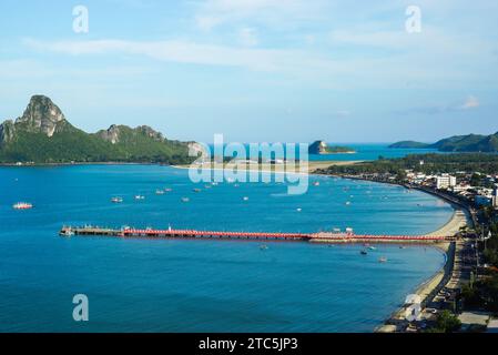 Aerial view of Prachuap Khiri Khan harbor southern of Thailand. Beautiful blue sea and green island with city and beach at Prachuap bay. Stock Photo