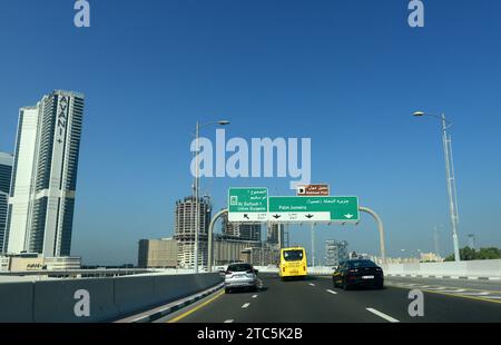 Driving on the E11 Sheikh Zayed Rd highway in the Media city and Internet city in Dubai, UAE. Stock Photo