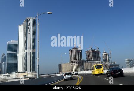 Driving on the E11 Sheikh Zayed Rd highway in the Media city and Internet city in Dubai, UAE. Stock Photo