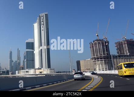 Driving on the E11 Sheikh Zayed Rd highway in the Media city and Internet city in Dubai, UAE. Stock Photo