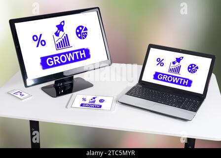 Growth concept shown on different information technology devices Stock Photo