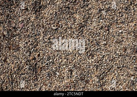 Close-up shot with gravel stones, pebbles as a background. Stock Photo