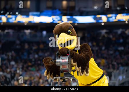Milwaukee, WI, USA. 9th Dec, 2023. Marquette Golden Eagles mascot, Iggy the Golden Eagle spins a noisemaker during the NCAA basketball game between the Notre Dame Fighting Irish and the Marquette Golden Eagles at the Fiserv Forum in Milwaukee, WI. Kirsten Schmitt/Cal Sport Media. Credit: csm/Alamy Live News Stock Photo