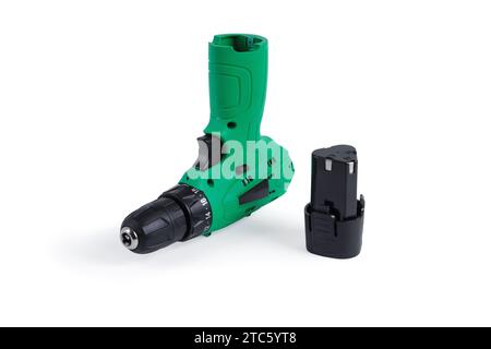 Green cordless screwdriver. Close-up. Isolated on white background. Stock Photo