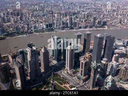 SHANGHAI, CHINA - APRIL 13, 2023: Giant skyscrapers in Pudong, Shanghai with Huangpu river Stock Photo