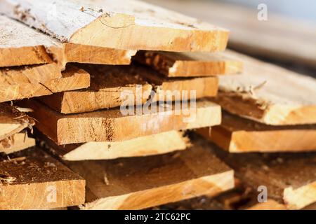 Large stack of wood planks, teak wood Stock Photo