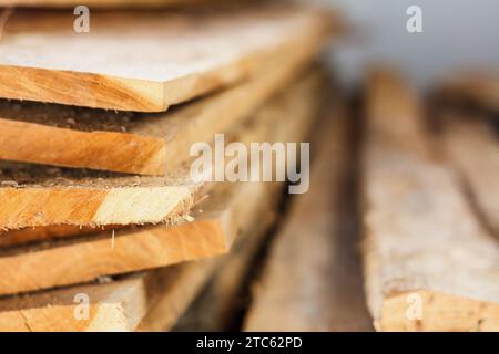 Large stack of wood planks, teak wood Stock Photo