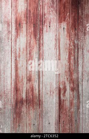 Vintage wood background and texture with red peeling paint. Stock Photo