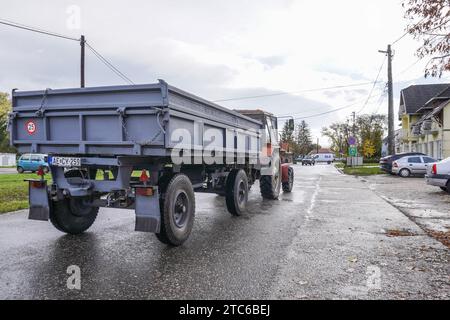 Farmer driving a tractor with a trailer is seen in Bogacs, Hungary on 8 November (Photo by Michal Fludra/NurPhoto) Stock Photo