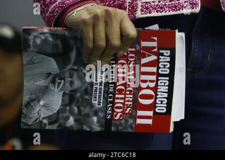 Mexico City, Mexico. 10th Dec, 2023. Claudia Sheinbaum Pardo, the sole pre-candidate of Morena, PT, and PV for the presidency of Mexico, is attending the presentation of the book ''The Merry Boys of Class Struggle'' by writer and director of the Economic Culture Fund (FCE), Paco Ignacio Taibo II, during the 15th Alameda Central Book Fair in Mexico City, Mexico, on December 10, 2023. (Photo by Carlos Santiago/Eyepix Group) (Photo by Eyepix/NurPhoto) Credit: NurPhoto SRL/Alamy Live News Stock Photo