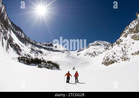 Two people snowshoeing on Cameron Pass, Colorado. Stock Photo