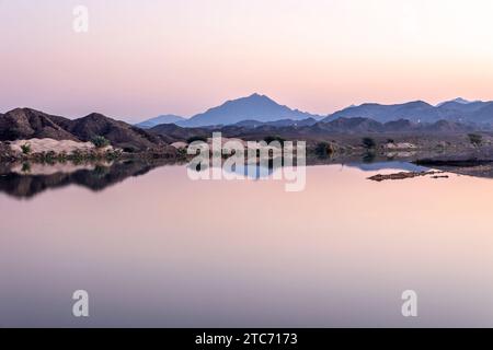 Beautiful sunrise from Wadi Al Buraq dam from Ras Al Khamiah, UAE. A good outing place for family and friends. Stock Photo