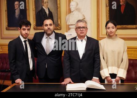 Oslo 20231211.The Peace Prize winner's family visits the President of the Parliament. Taghi Rahmani (husband), Kiana Rahmani (daughter), Ali Rahmani (son), Hamidreza Mohammadi (brother) visit Parliament President Masud Gharahkhani. Photo: Ole Berg-Rusten / NTB / POOL Stock Photo