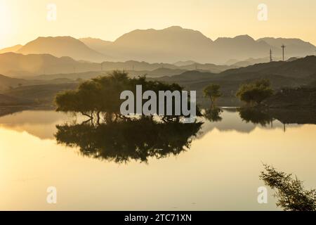 Beautiful sunrise from Wadi Al Buraq dam from Ras Al Khamiah, UAE. A good outing place for family and friends. Stock Photo
