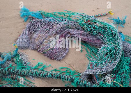 Discarded fishing nets on Lossiemouth east beach. Morayshire, Scotland Stock Photo