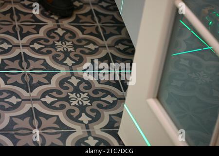 Laser level measuring tool in construction site for laying tiles Stock Photo