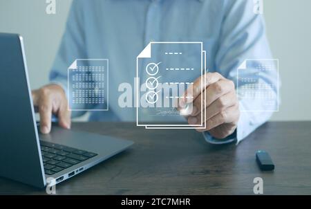 E-signing and e-document management concept. Electronic signature, paperless document management. A man signs an electronic document or digital doc on Stock Photo