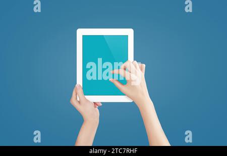 Female hands holding tablet with blank screen isolated Stock Photo