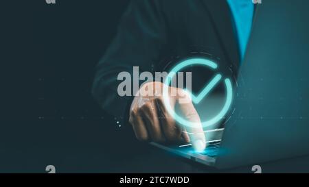 Businessman hand touching glowing correct sign mark with copy space area for document approval and project approve concept, mark correct for online ap Stock Photo