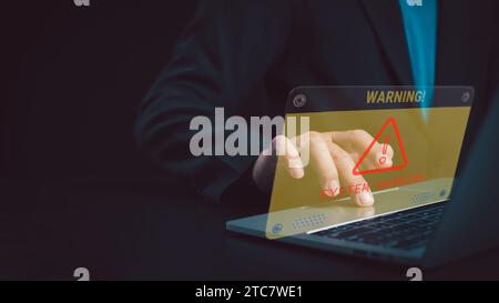 Cyber security and cybercrime, System hacked warning alert on Laptop, Cyber attack on computer network, Virus, Spyware, Malware or Malicious software, Stock Photo