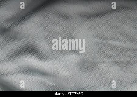 Close-up of fabric texture background with folds and shadows Stock Photo