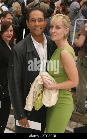 Bryant Gumbel and wife Hilary Quinlan arriving at the premiere of 'The Day After Tomorrow' at The American Museum of Natural History in New York City on May 24, 2004.  Photo Credit: Henry McGee/MediaPunch Stock Photo