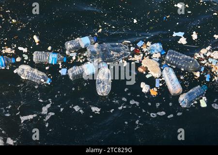 Plastic bottles in the sea. Garbage and pollution. Environmental issues Stock Photo