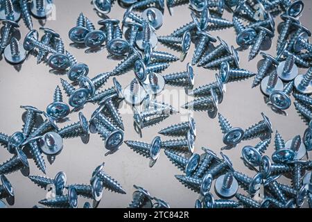 Small screws background Stock Photo