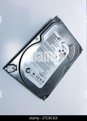 Surakarta, Indonesia - Desember 4, 2023: The Seagate brand hard disk is in damaged condition with a capacity of 500GB Stock Photo