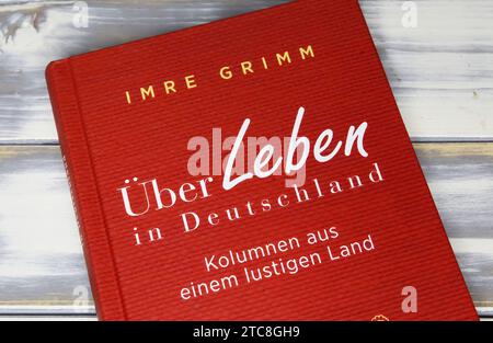 Viersen, Germany - May 9. 2023: Closeup of Imre Grimm book Über leben in Deutschland Stock Photo