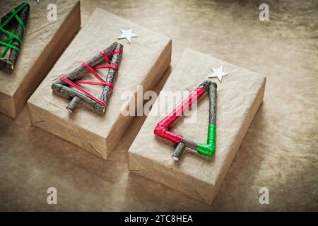 Composition of Christmas gift boxes on vintage paper Stock Photo