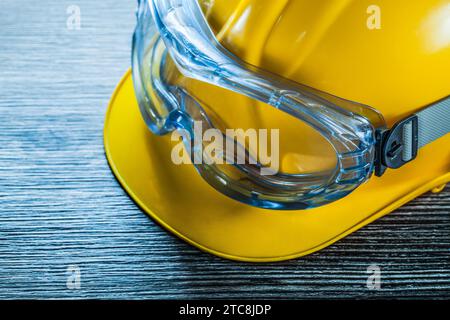 Safety cap glasses on vintage wooden board Stock Photo