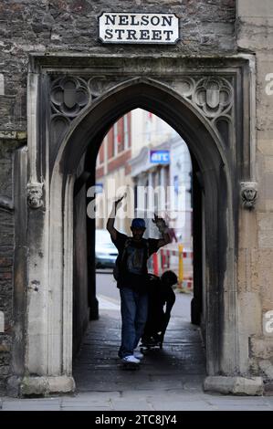 Street sign above the archway to Broad Street from the historic city wall section of Nelson Street in Bristol, which is to be transformed by a street Stock Photo