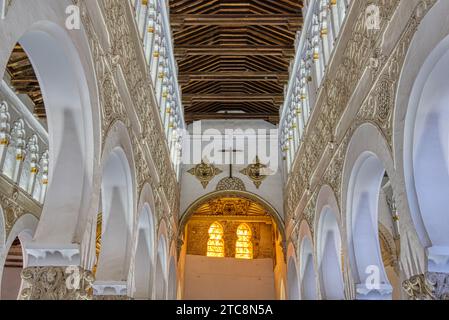 Beautiful old moorish or horseshoe arches in the Synagogue of Santa María la Blanca.  The building is believed to be Stock Photo