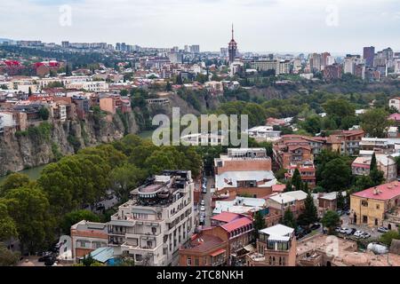 Tbilisi, Georgia - September 23, 2023: above view of Tbilisi city with sulphuric baths from Narikala fortress on cloudy autumn day Stock Photo