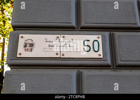 Tbilisi, Georgia - September 27,2023: sign with house number on wall of building on Shota Rustaveli Avenue of Tbilisi city on sunny autumn day Stock Photo