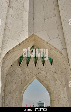 Teheran, Iran, 06.25.2023: Tower in Iran, tower of freedom or liberty low detail gate view with city view. Stock Photo