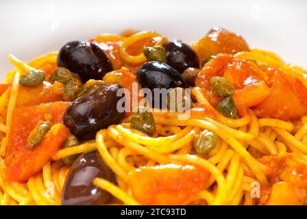 Spaghetti pasta with fresh home made puttanesca sauce Stock Photo