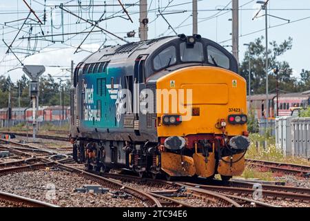 37423 'Spirit Of The Lakes' running light engine at Carnforth Railway Station. Stock Photo