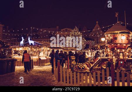 Tallinn, Harju County, Estonia-11DEC2023: Tallinn Christmas Market on the Town Hall Square 2023-2024. Vintage style. Stock Photo