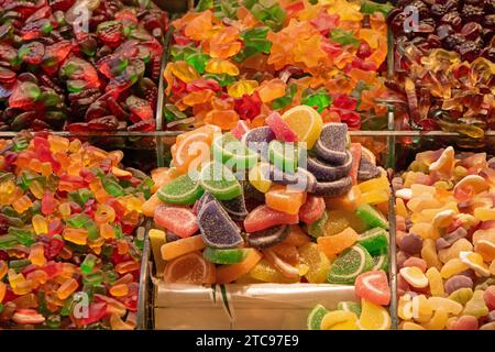 Sweet colorful jelly candy pile sold outside on a market Stock Photo