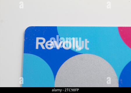 A close up photo of the Revolut Junior bank card on a white background. Stock Photo