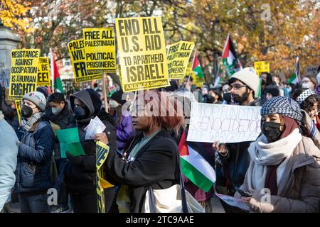 Pro-Palestinian rally held on Black Friday in New York City to protest the US support and complicity with Israel in bombing Gaza, indiscriminately killing thousands of civilians after the October 7, 2023 Hamas attack on Israel. Stock Photo