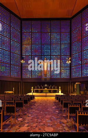 Berlin, Germany - July, 25, 2023: Interior of the modern chapel with crucified Jesus Christ of Kaiser Wilhelm Memorial Church, Gedachtniskirche, in the Charlottenburg district of Berlin Stock Photo