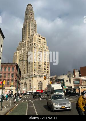 The iconic Williamsburg Savings Bank Building rises up in the Fort Greene neighborhood viewed from Flatbush Avenue in Brooklyn, New York. Stock Photo