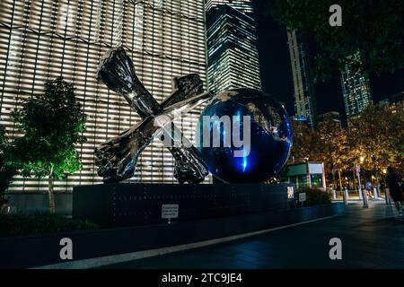 Manhattan, New York, USA - December 2th 2023 XO World Sculpture by Daniel Anderson at the World Trade Center at night. High quality photo Stock Photo