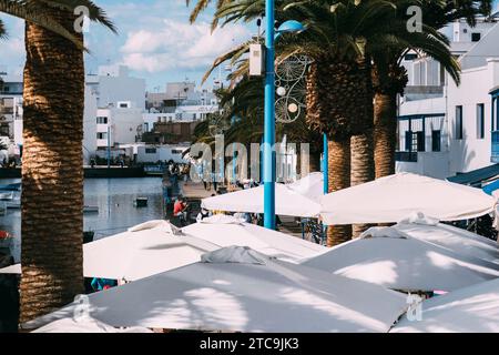 Lanzarote, Spain - November 25, 2023: Port beach and boats in Arrecife, Lanzarote, Canary Islands, Spain, Europe Stock Photo