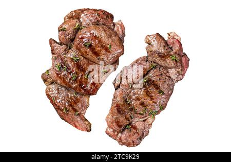 Grilled Lamb chop leg steaks, mutton meat with herbs. Isolated, white background Stock Photo